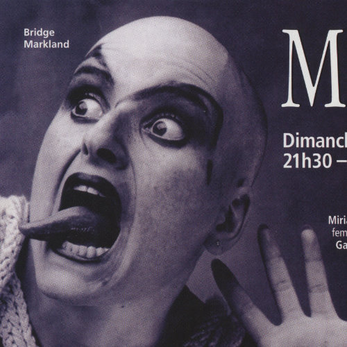 Publicité du Meow Mix avec le drag king berlinois Bridge Markland. Crédit photo : Udo Hesse. Source : Divers/Cité, 2003. Collection des Archives gaies du Québec.